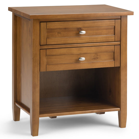 Wooden bedside table with two drawers, light brown finish, natural background.