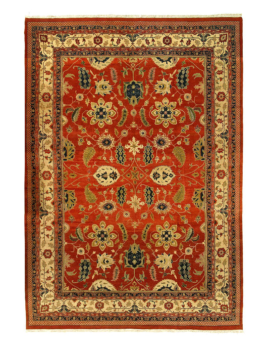 A vibrant red and beige hand-knotted rug with intricate floral patterns and symmetrical designs.