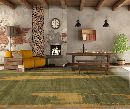 Living room with a large green and gold hand-knotted Tibetan area rug, wooden furniture, and a rustic fireplace.