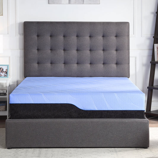 Bench-style bed frame with tufted headboard, blue mattress in hybrid foam, gray upholstery, white wall, small shelf with frame, ladder.