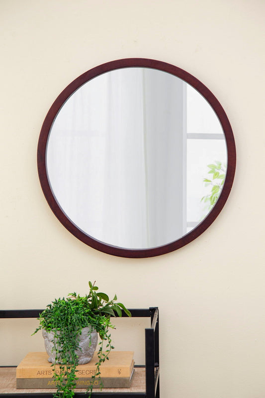 Circle Wall Mirror With Wooden Frame for Living Room hanging on wall, dark wood frame, indoor setting
