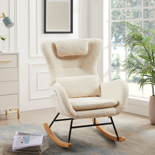 Beige sheepskin rocking chair with wooden base, white dresser, blue lamp, palm plant, window with trees visible in background.