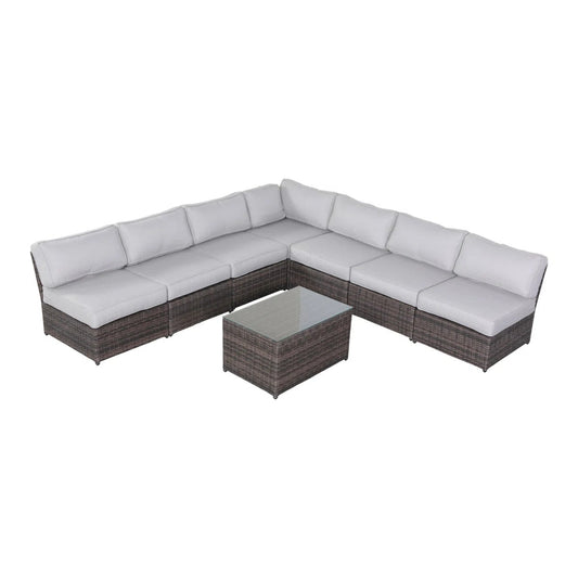 Six-person wicker outdoor seating group with white cushions.