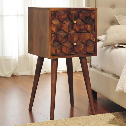 A solid wood mini cube nightstand with 2 drawers, finished in chestnut color, placed in a bedroom setting.