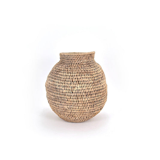 Woven basket with natural finish on white background