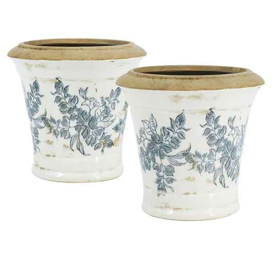 Two ceramic planters with floral pattern, white with blue accents, textured appearance.