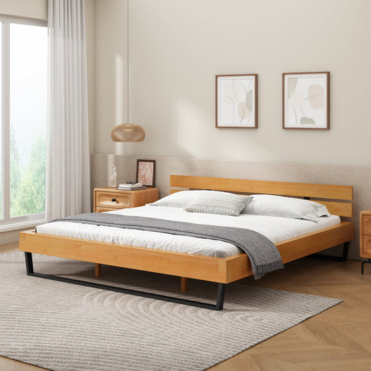 King-size bed frame with natural pine wood and metal legs, white bedding and throw blanket, neutral colors, modern bedroom setting