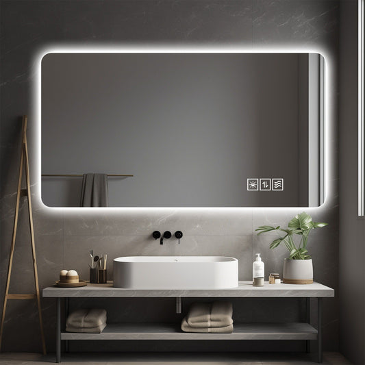 Wall-mounted bathroom mirror with white frame and black lighting elements, shown against a modern bathroom background with a white sink and towel. Walls are dark gray. No text or watermarks.