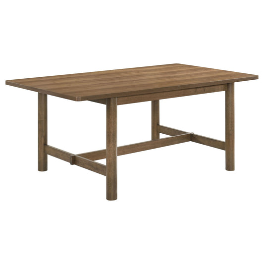 Plain wood rectangular table with simple legs, likely walnut in its natural brown finish.