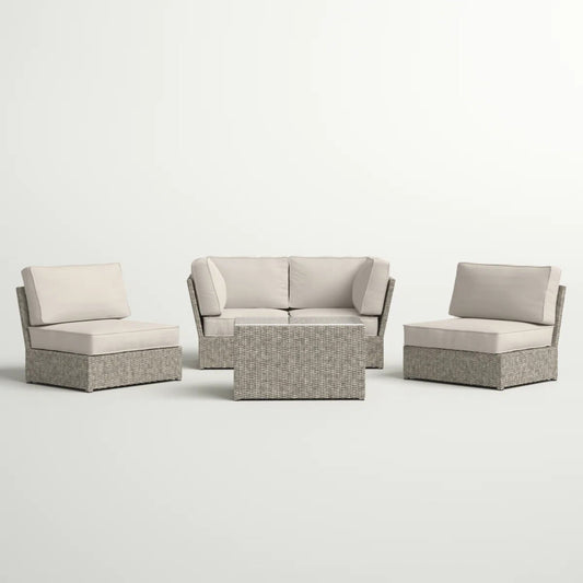 Fully assembled wicker patio seating group with two chairs and a two-seater sofa, each with beige cushions placed against a white background.