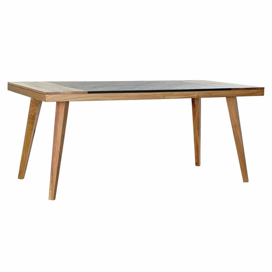 Modern dining table with a black top and light wood legs, viewed from a slight angle.