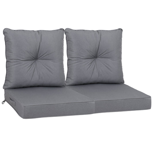 Two light gray outdoor patio cushions with tufted detailing