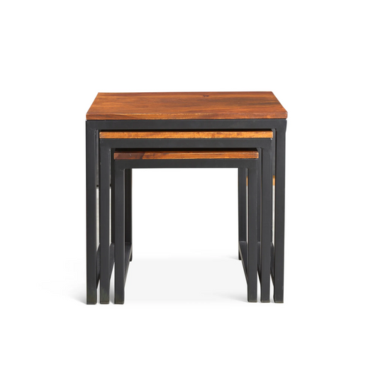 Solid sheesham wood nesting tables with black metal frames, light wood color, against white background.