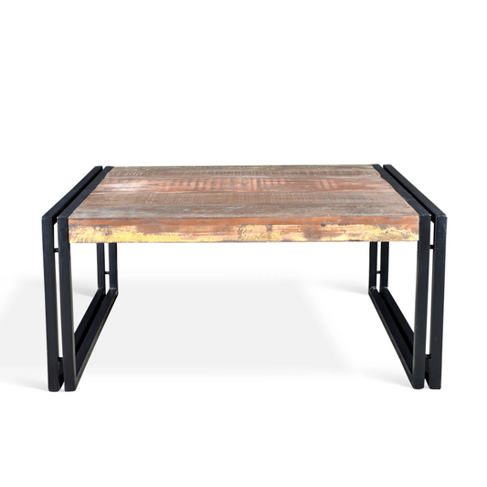 Reclaimed wood coffee table with metal legs, multicolored wood surface, light background