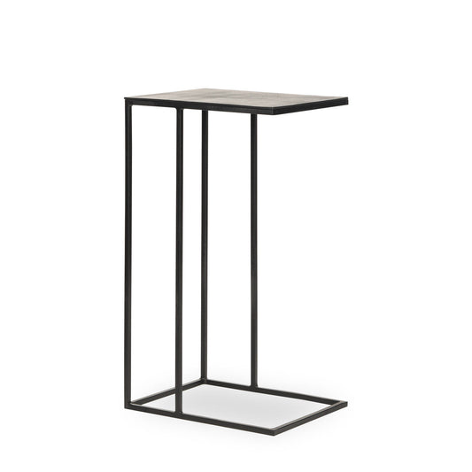 Modern C-shaped table with black metal frame and grey concrete-like top.