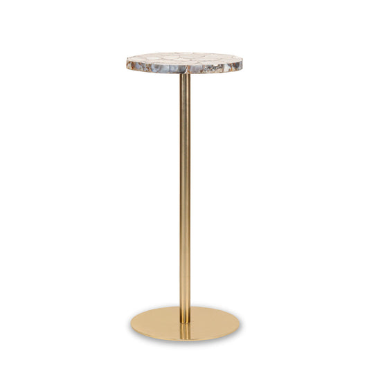 Coral agate top, gold metal stand on plain background