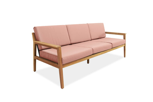 A wooden sofa with pink cushions and three backrests, placed against a white background.