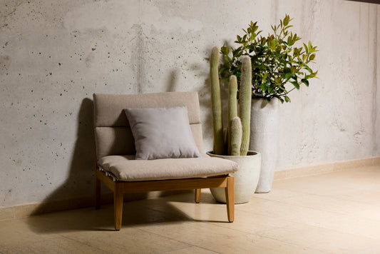 Arno Modular Side Chair, Light or Dark - 2pc, light wood frame, beige upholstery, near cacti and indoor plant, concrete wall background, white floor