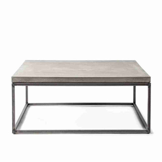 Rectangular GFRC concrete table with steel legs, light gray finish, on white background