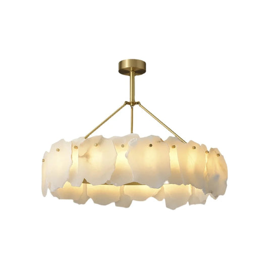 Irregular Burton Alabaster Chandelier with a white alabaster body and a brass fixture hanging from the ceiling.