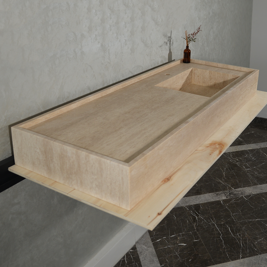 Travertine sink with visible wood edges on a modern bathroom countertop