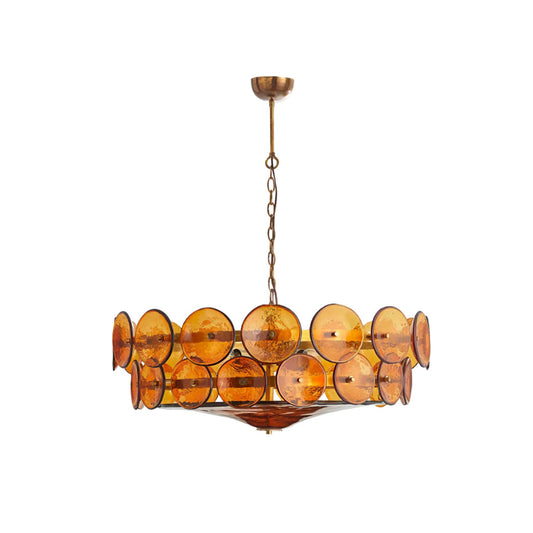 A Murano glass chandelier with orange discs and a brass frame on a white background