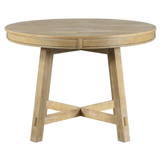Round wooden dining table with extending leaf, natural wood finish with weathered effect.