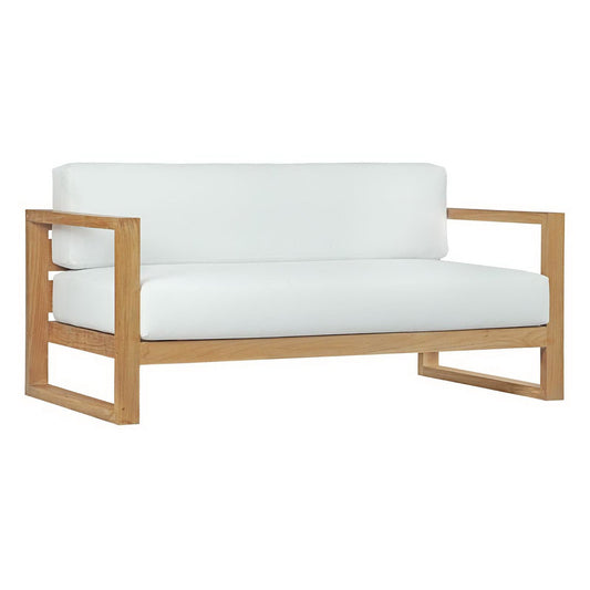 Teak sofa with white cushions on a plain background