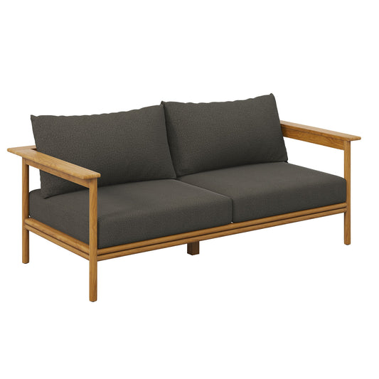 Teak wood sofa with dark grey cushions on plain background.