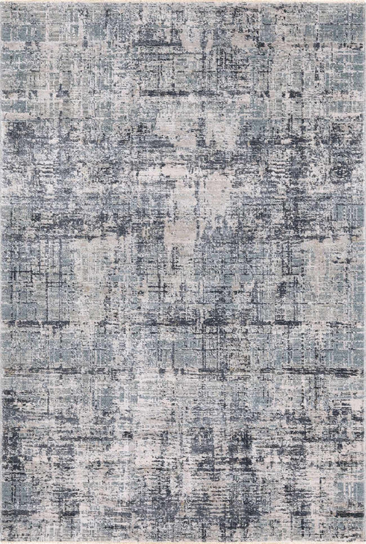 Abstract patterned rug with a mix of grayscale and white tones.