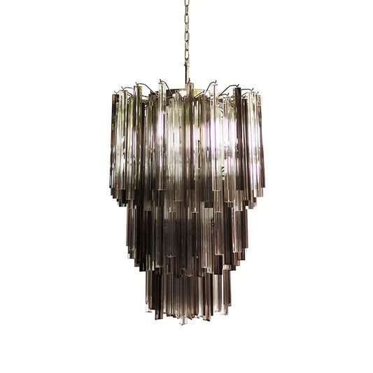 A Murano glass chandelier with translucent prisms and a dark smoked finish.