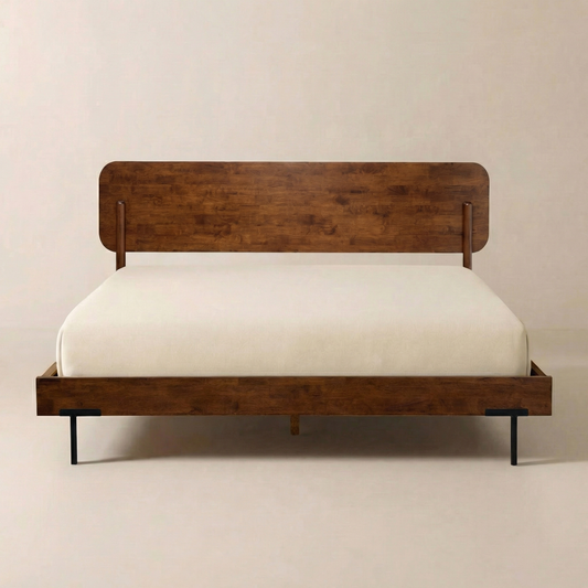 Solid wood bed frame with dark brown finish, white mattress, minimalist setting