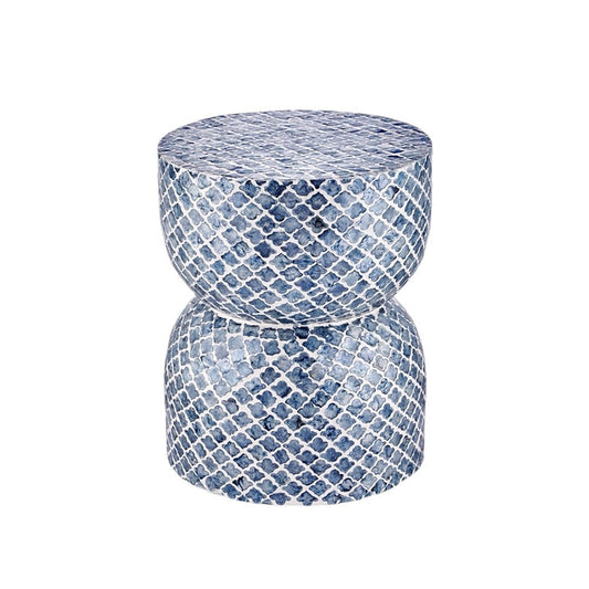 Blue and white patterned cylindrical table with textured inlay