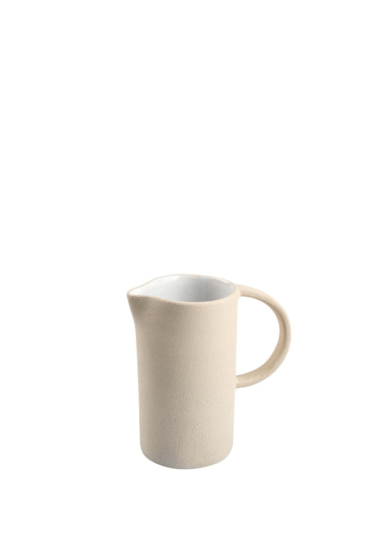Neutral-toned, textured stoneware pitcher against a plain white background