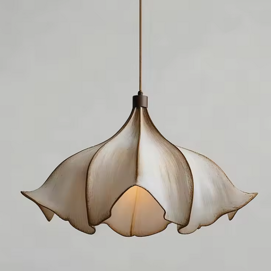 Handcrafted wood and resin bloom pendant light, cream and gold, hanging against white background