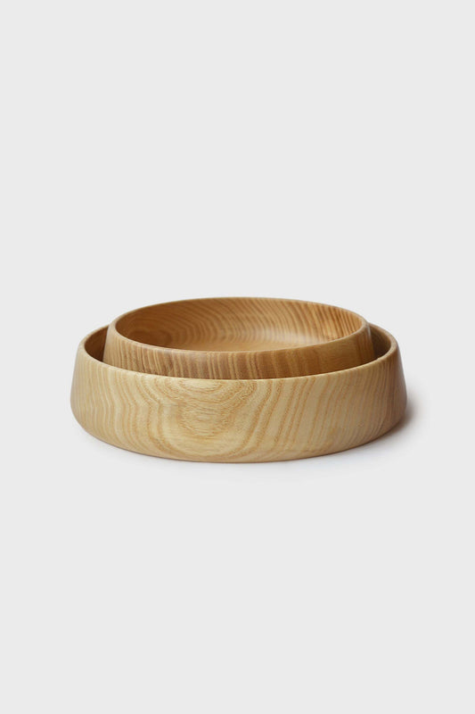 Hand carved wooden bowls with natural finish, light color. No setting.
