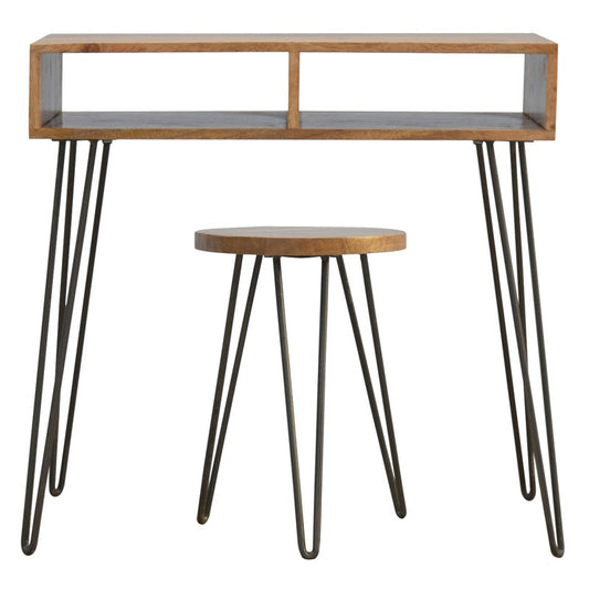 An industrial-style writing desk with a wooden surface and metal hairpin legs. The stool has a circular wooden seat with similar legs.
