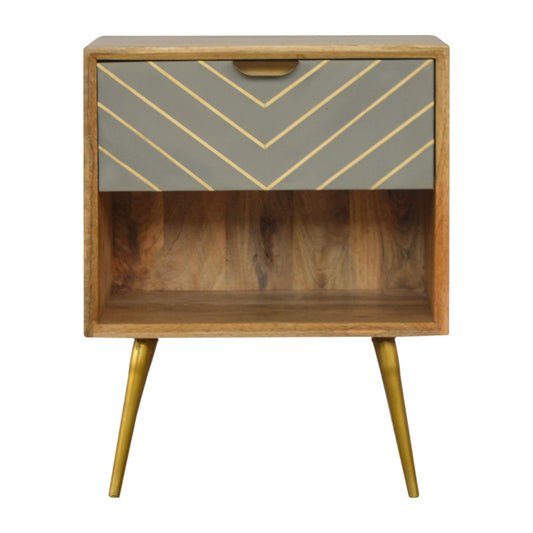 Sleek bedside table with wooden frame, brass legs, and a gray drawer liner with golden geometric design.
