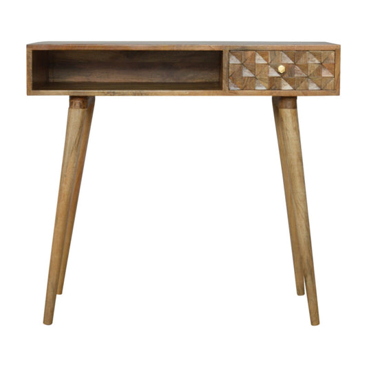 Tall wooden desk with diamond-shaped carved drawer, light brown finish, modern design