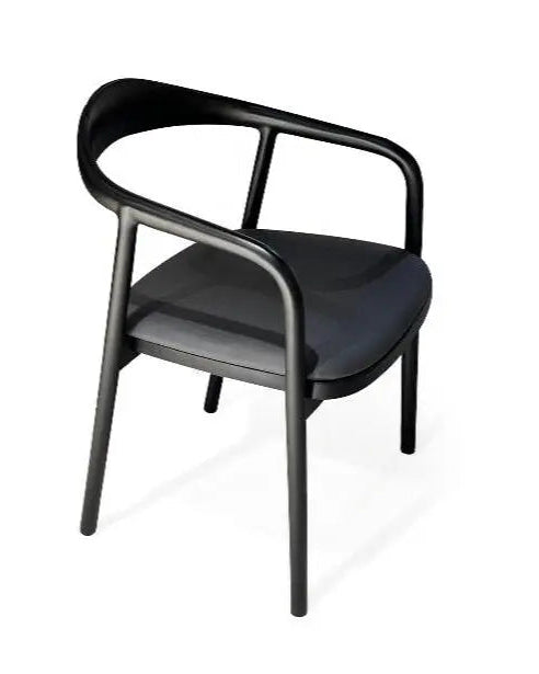 A black solid walnut handcrafted chair with a clean and minimal design against a white background.