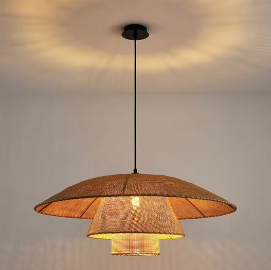 3-Tier Rattan Pendant Light with woven texture, warm beige color against a neutral wall.