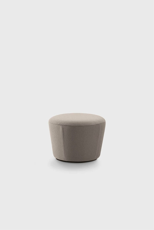 Minimalist pouf with rounded top and base in light grey fabric on a plain white background.