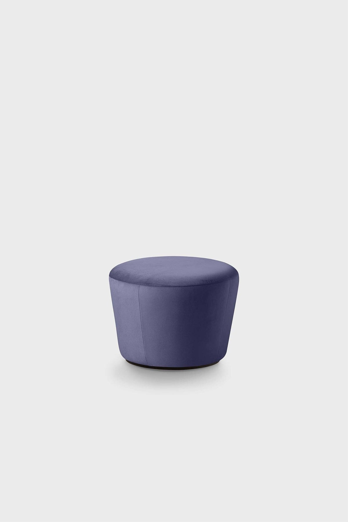 A cylindrical, smooth, plush, navy blue pouf against a plain white background.