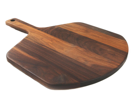 Wooden pizza peel with a handle, dark brown finish, no background