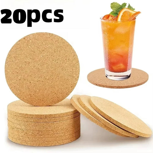 20 natural round wooden cork coasters with a drink placed on one of them