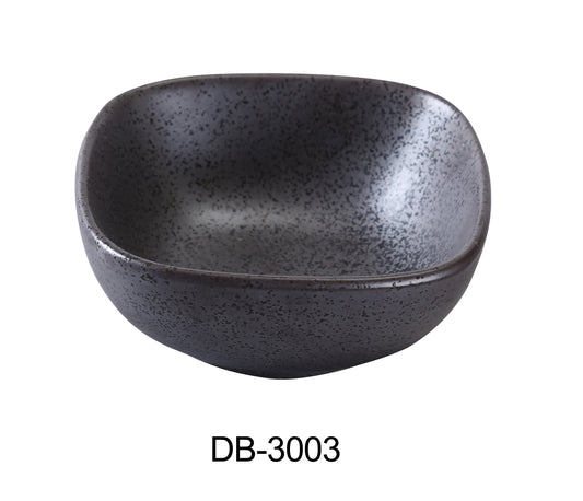 A speckled, dark gray ceramic bowl with an uneven surface texture, placed against a white background.