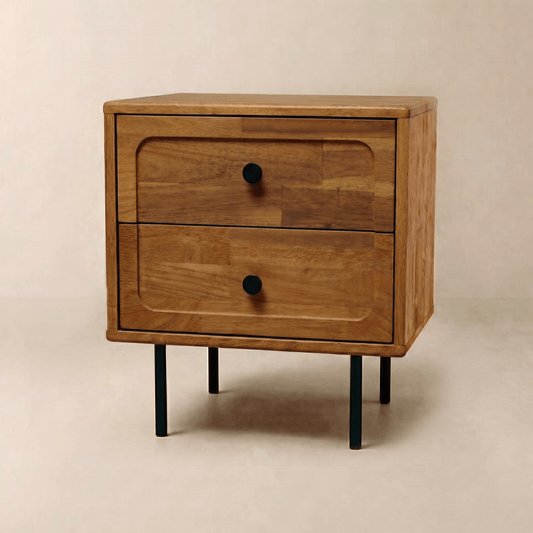 Light brown wooden nightstand with two drawers, each featuring a simple dark knob, black metal legs against a plain backdrop.