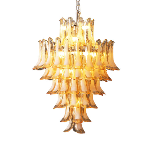 Stacked Murano glass petal design chandelier, amber hue, suspended from a metal chain.