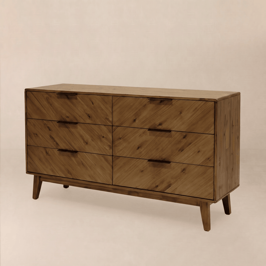 Wooden dresser with six drawers, featuring a natural wood finish and light brown hue against a neutral backdrop.
