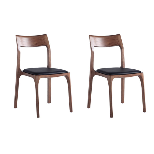 Two modern wooden chairs with black vegan leather seats against a plain background.